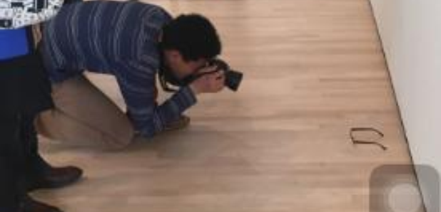 Man takes pictures of glasses